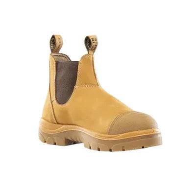 Tan Chelsea boot on a white background