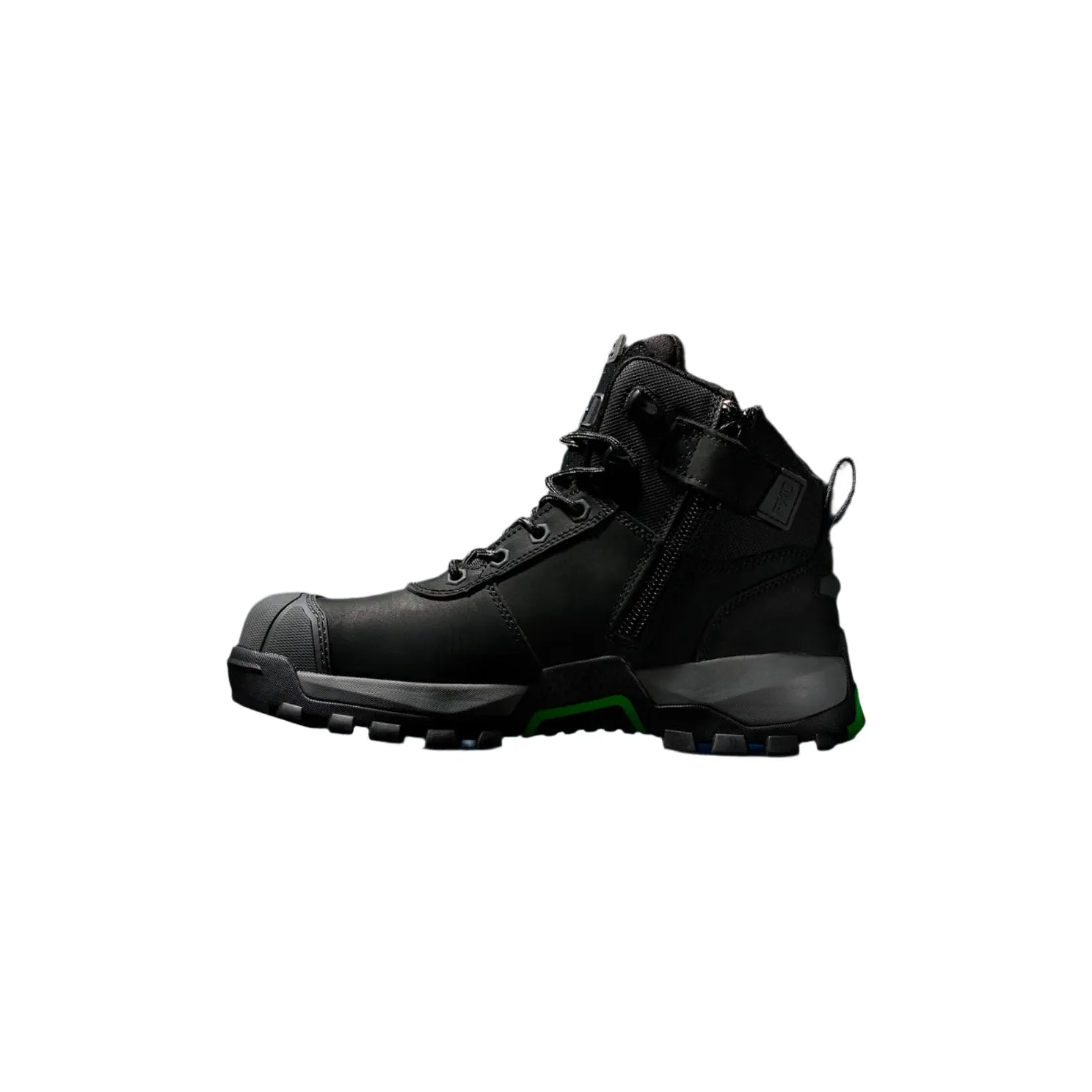Black hiking boot with green accents on a black background