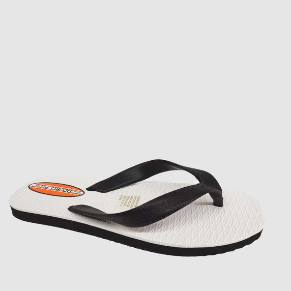 Black and white sandal with a visible brand logo on a light gray background